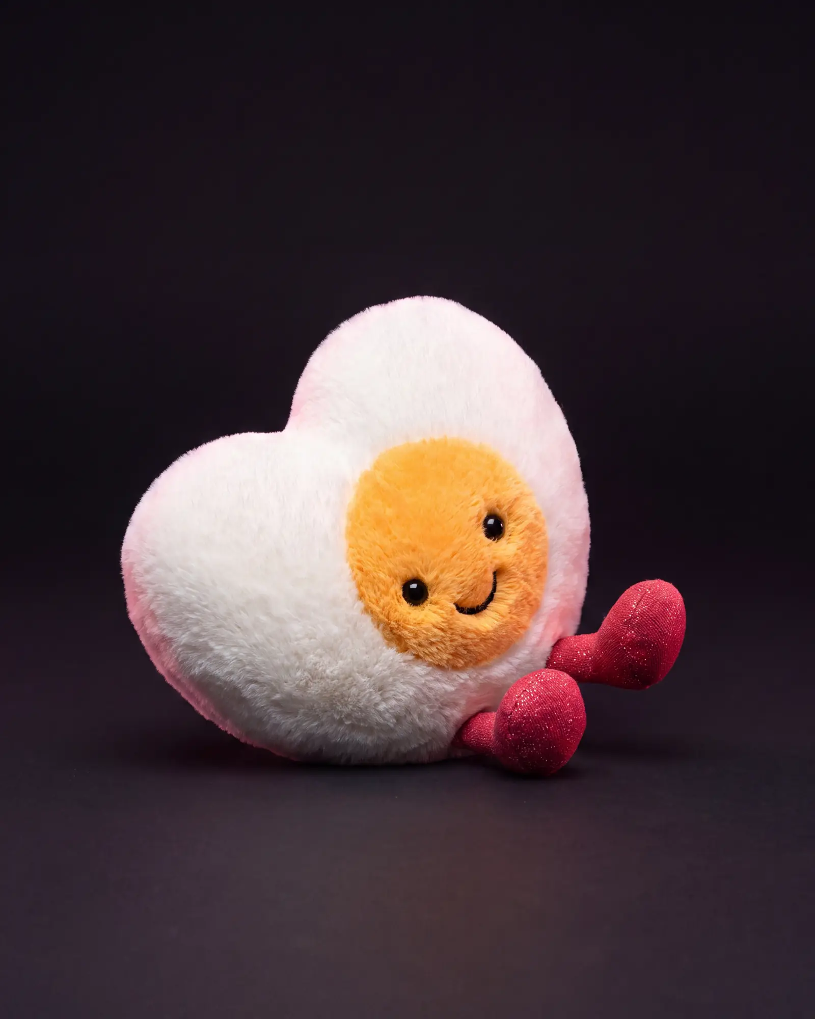 Amuseables Heart Boiled Egg on a dark studio background.