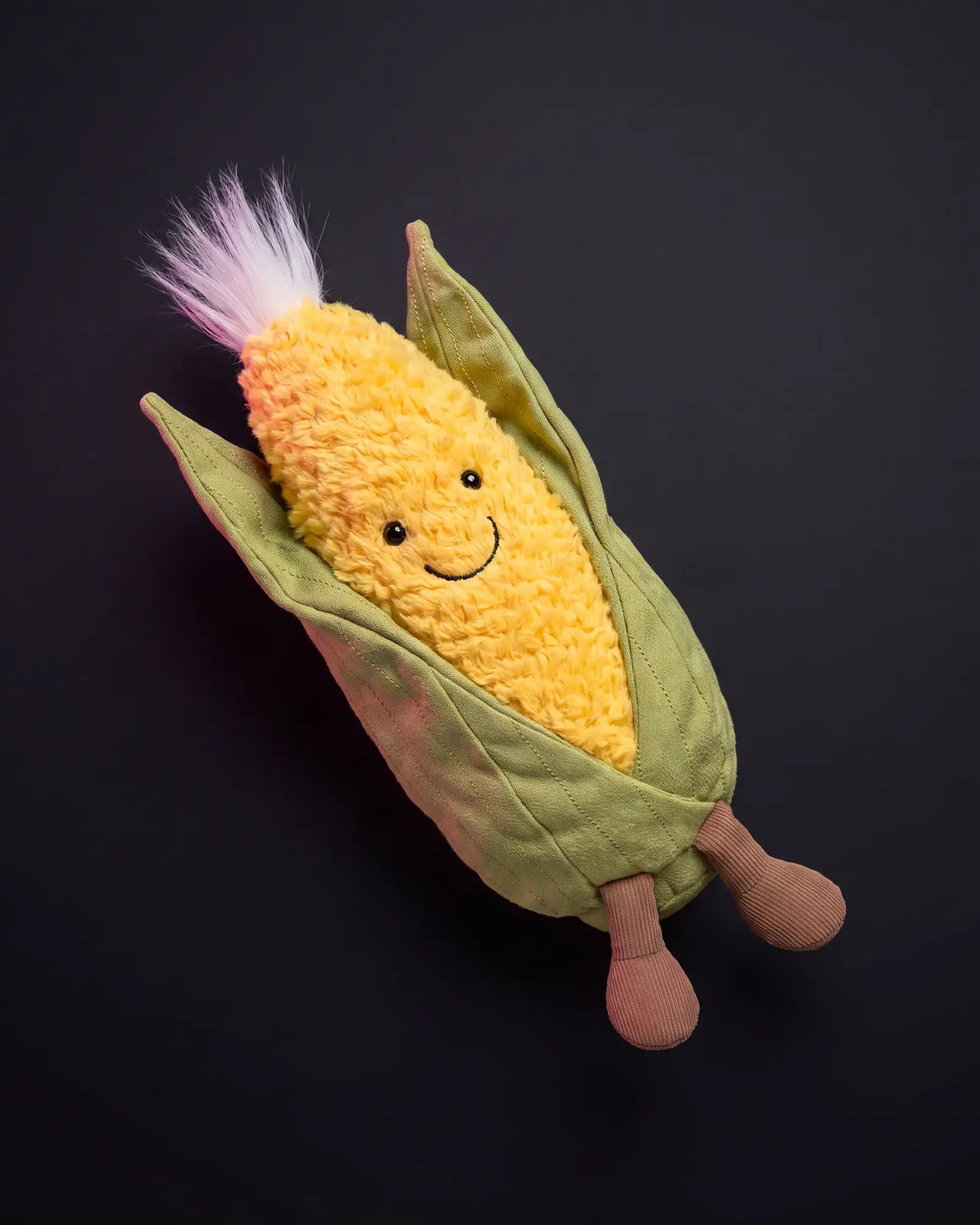 Amuseables Sweetcorn on a dark studio background.